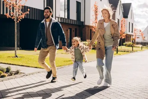 Family walking in townhome community